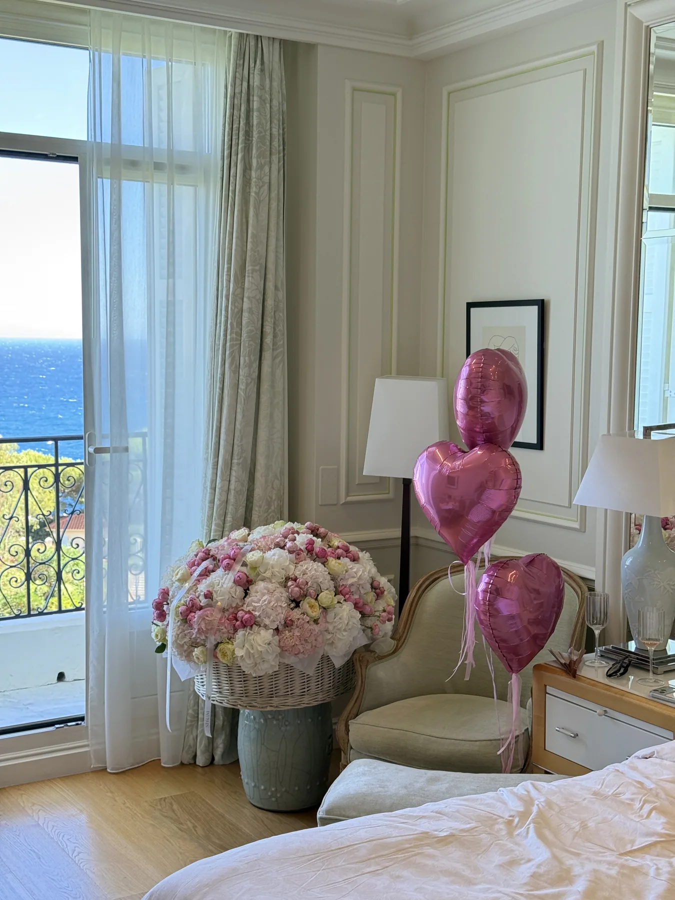 Flowers and balloons prepared in a room overlooking the sea