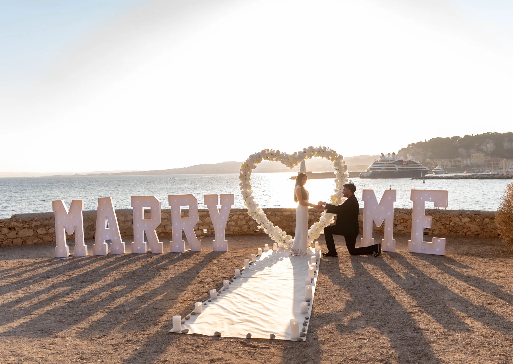 A proposal with a &ldquo;Marry Me&rdquo; setup on the French Riviera